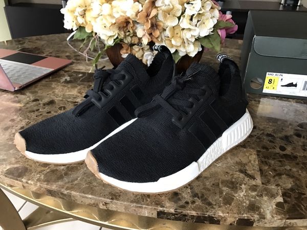 JUST IN: Camouflaged down, the Bape x adidas NMD R1 in green