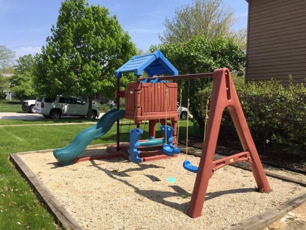little tikes swing set playhouse