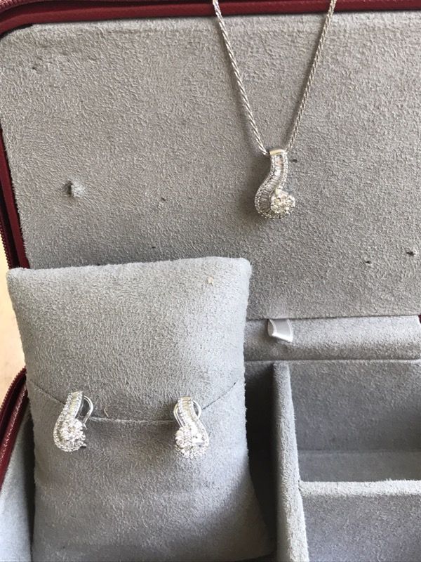 14kt white gold earrings and matching necklace diamonds and baguets