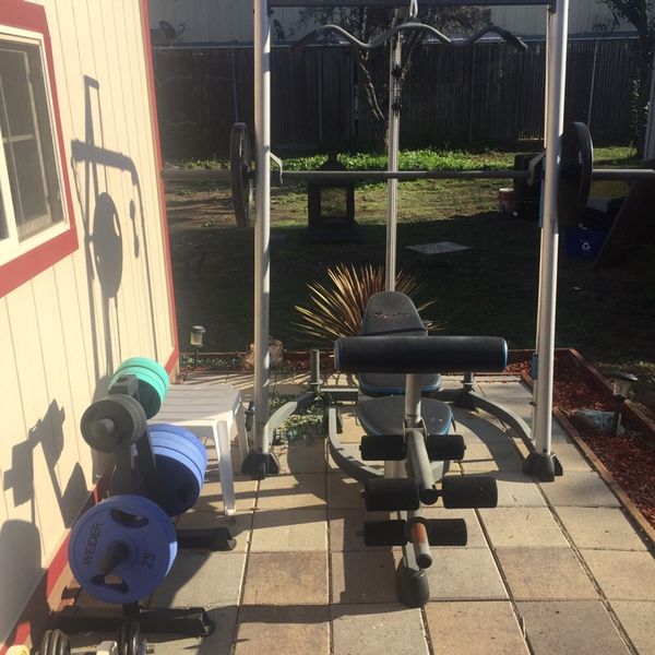 Pro form xp 300 gym set 370lbs weider olympic weights and weight tree